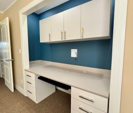 Custom office with doors, drawers, matte colors, chrome hardware in Dade City, Florida.