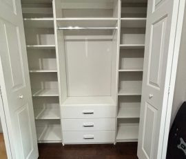 Custom reach-in closet project with drawers, chrome hardware in Land O' Lakes, Florida. Custom reach-in closet with drawers, chrome hardware in Land O' Lakes, Florida.