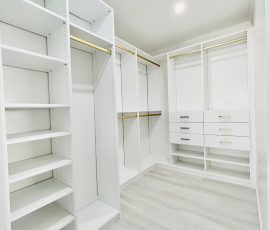 Custom walk-in closet project with drawers, gold hardware in Spring Hill, Florida. Custom walk-in closet with drawers, gold hardware in Spring Hill, Florida.