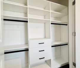 Custom reach-in closet project with drawers, black hardware in Wesley Chapel, Florida. Custom reach-in closet with drawers, black hardware in Wesley Chapel, Florida.