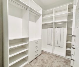 Custom walk-in closet with drawers, aluminum hardware in San Antonio, Florida.