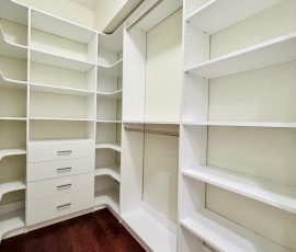 Custom walk-in closet project with drawers, corner shelves in Land O' Lakes, Florida. Custom walk-in closet with drawers, corner shelves in Land O' Lakes, Florida.