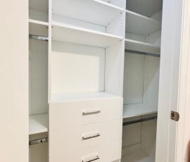 Custom reach-in closet project with drawers, chrome hardware in Dade City, FL. Custom reach-in closet with drawers, chrome hardware in Dade City, FL