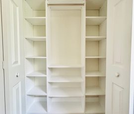 Custom reach-in closet project with nickel hardware in Land O' Lakes, Florida. Custom reach-in closet with nickel hardware in Land O' Lakes, Florida.