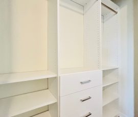 Custom reach-in closet project with drawers, nickel hardware in Land O' Lakes, Florida. Custom reach-in closet with drawers, nickel hardware in Land O' Lakes, Florida.