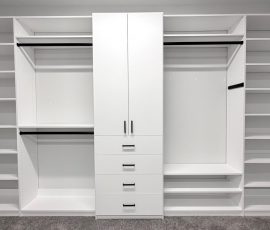 Custom walk-in closet project with doors, drawers, corner shelves, black hardware in Lithia, Florida. Custom walk-in closet with doors, drawers, corner shelves, black hardware in Lithia, Florida.