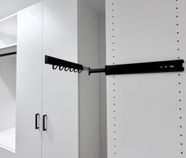 Custom walk-in closet project with doors, drawers, corner shelves, black hardware in Lithia, Florida. Custom walk-in closet with doors, drawers, corner shelves, black hardware in Lithia, Florida.